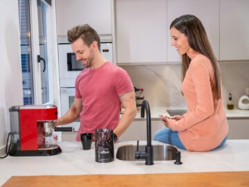 Couple in the kitchen in the morning