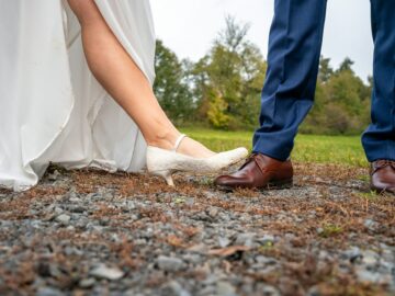 the bride's shoes at the autumn wedding soar to the groom's shoes.